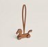 Cheval a Roulettes charm