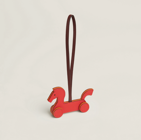 Cheval a Roulettes charm