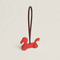Cheval a Roulettes charm